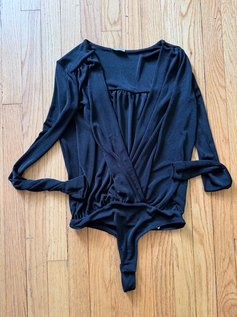 Free People Turnt Black Surplice Neckline Draped Bodysuit XS long sleeve thong